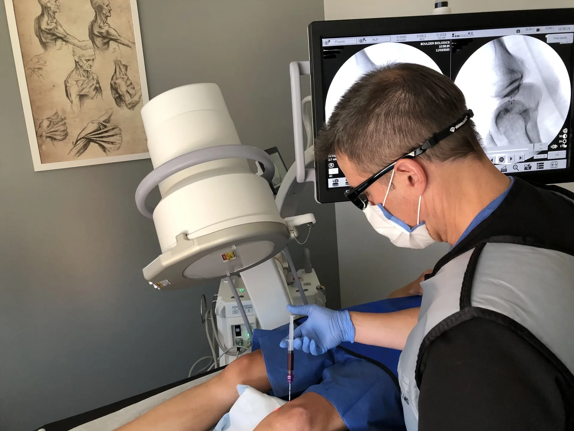 Dr. Glowney performing a fluoroscopy-guided injection